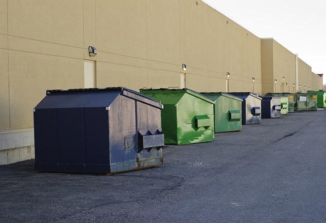 several large trash cans setup for proper construction site cleanup in Bonsall